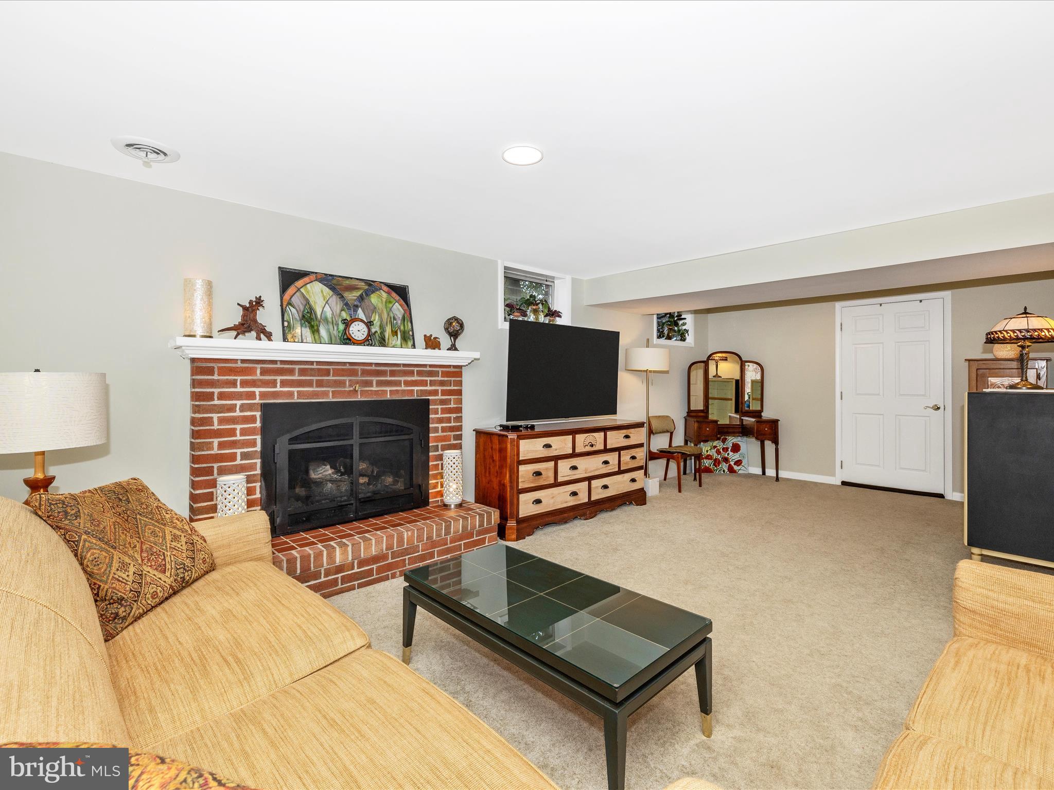 16 Kline Boulevard Frederick, MD 21701 - Photo 15 of 62 a living room with furniture and a fireplace