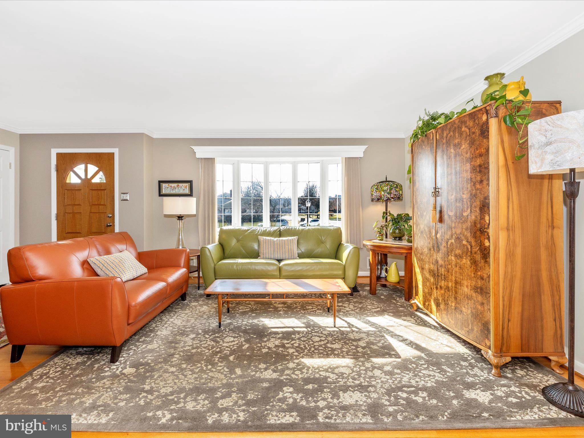 16 Kline Boulevard Frederick, MD 21701 - Photo 19 of 62 a living room with furniture and a floor to ceiling window