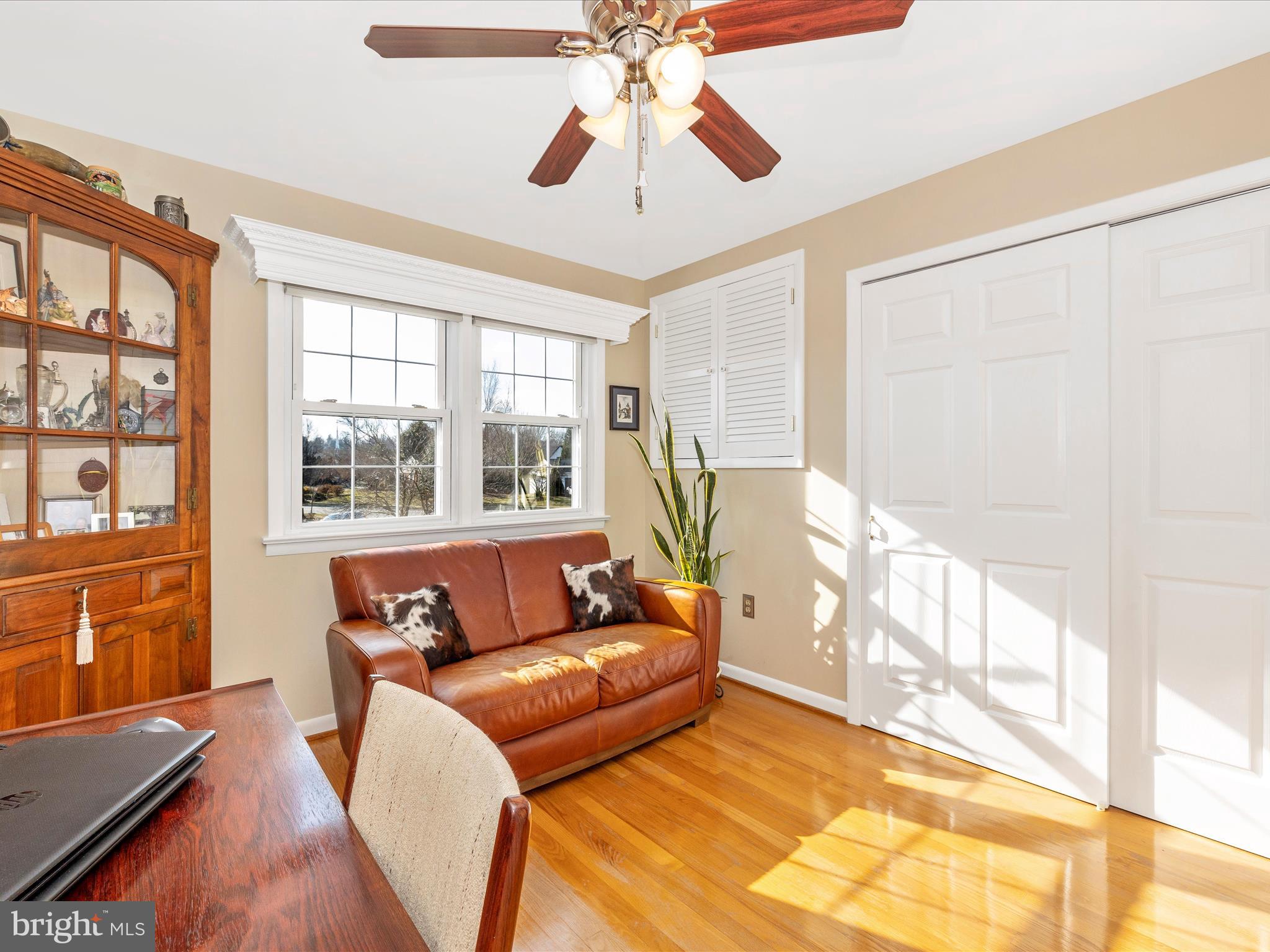 16 Kline Boulevard Frederick, MD 21701 - Photo 32 of 62 a living room with furniture and a large window