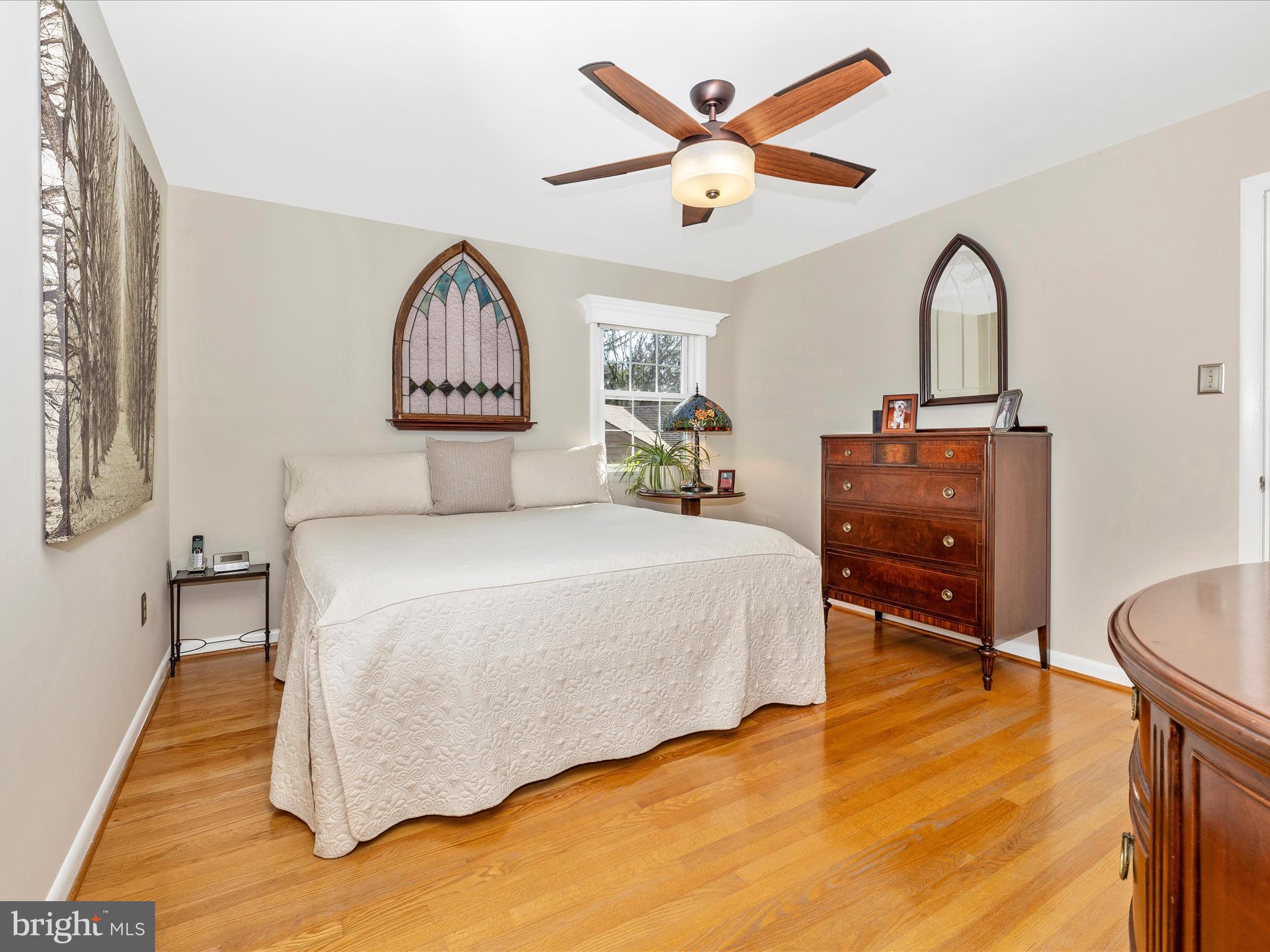 16 Kline Boulevard Frederick, MD 21701 - Photo 6 of 62 a bedroom with a bed and a dresser with mirror