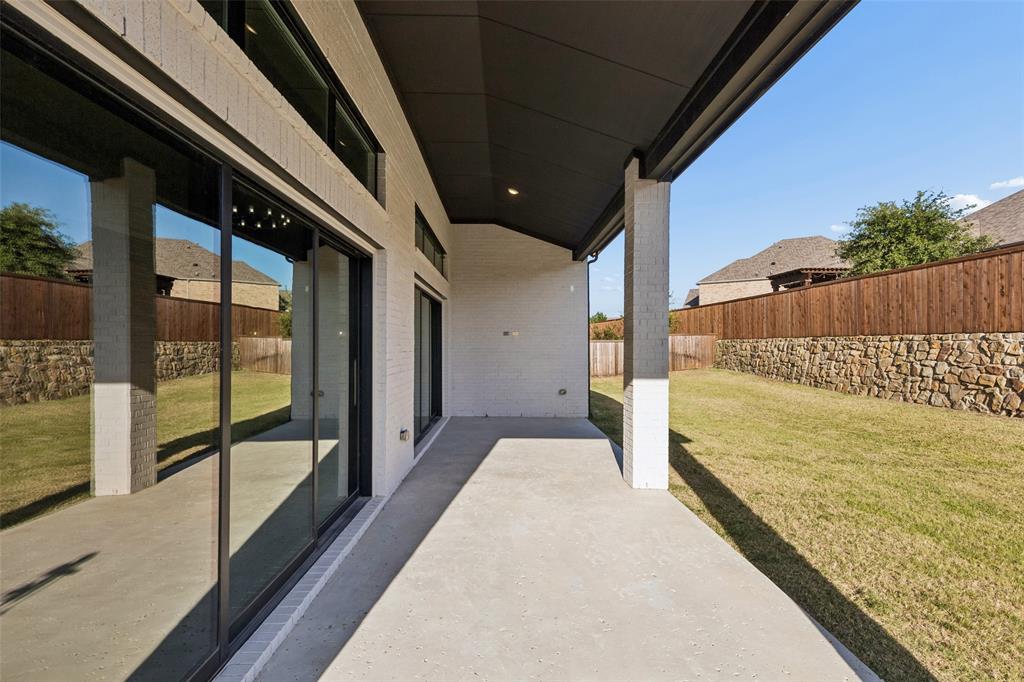 11609 Rust Falls Road Flower Mound, TX 76226 - Photo 33 of 39 No need to extend a patio. This one's already finished!