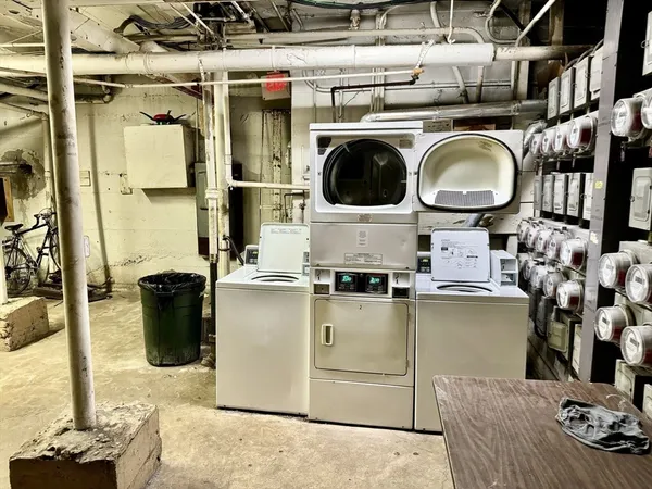 a storage room with washer and dryer