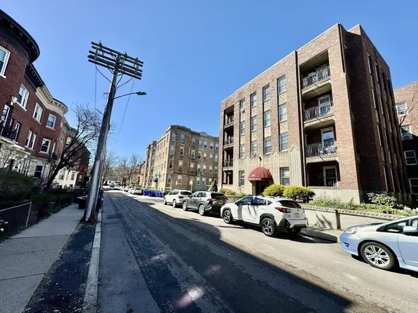 a car parked on the side of a street