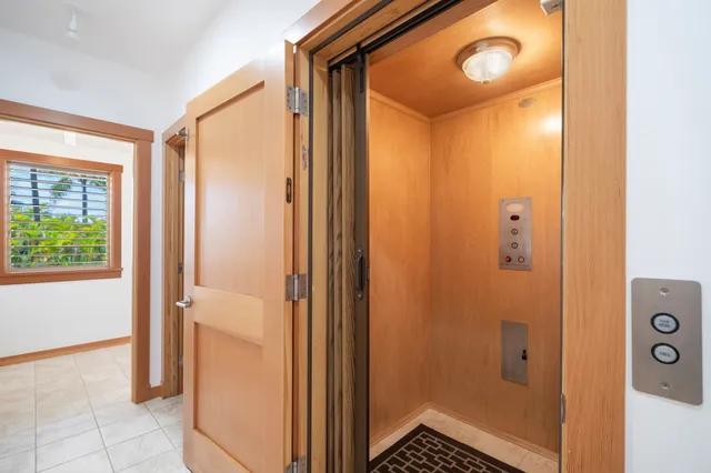 a view of a bathroom with a shower and a sink