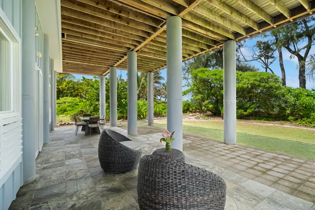 a living room with couch and a patio