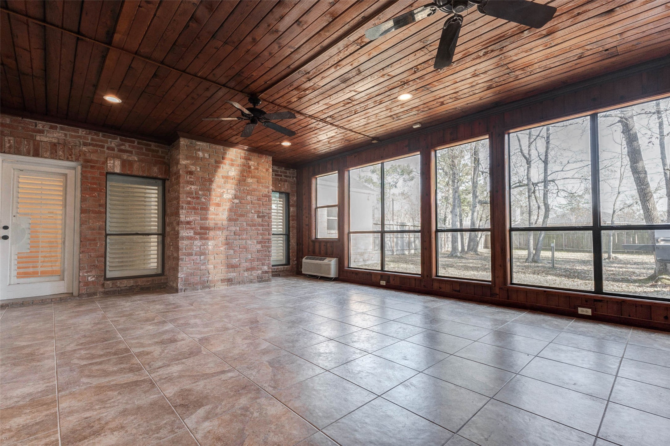 7631 Post Bridge Road Spring, TX 77389 - Photo 17 of 50 Enclosed patio on the 1st floor with an AC unit