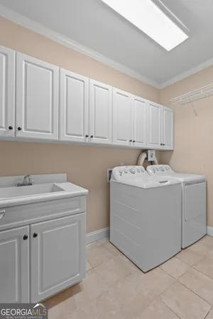 a view of empty room with white walls
