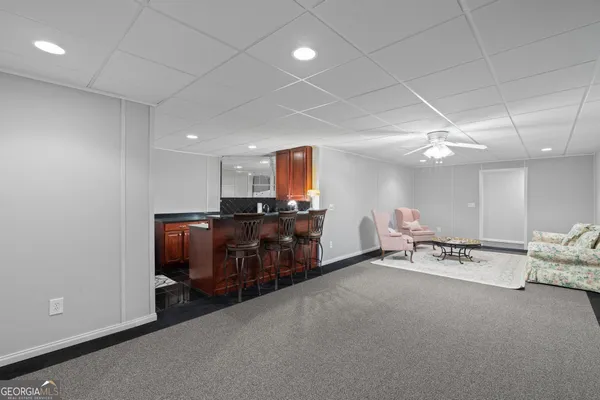 a view of a swimming pool with a house