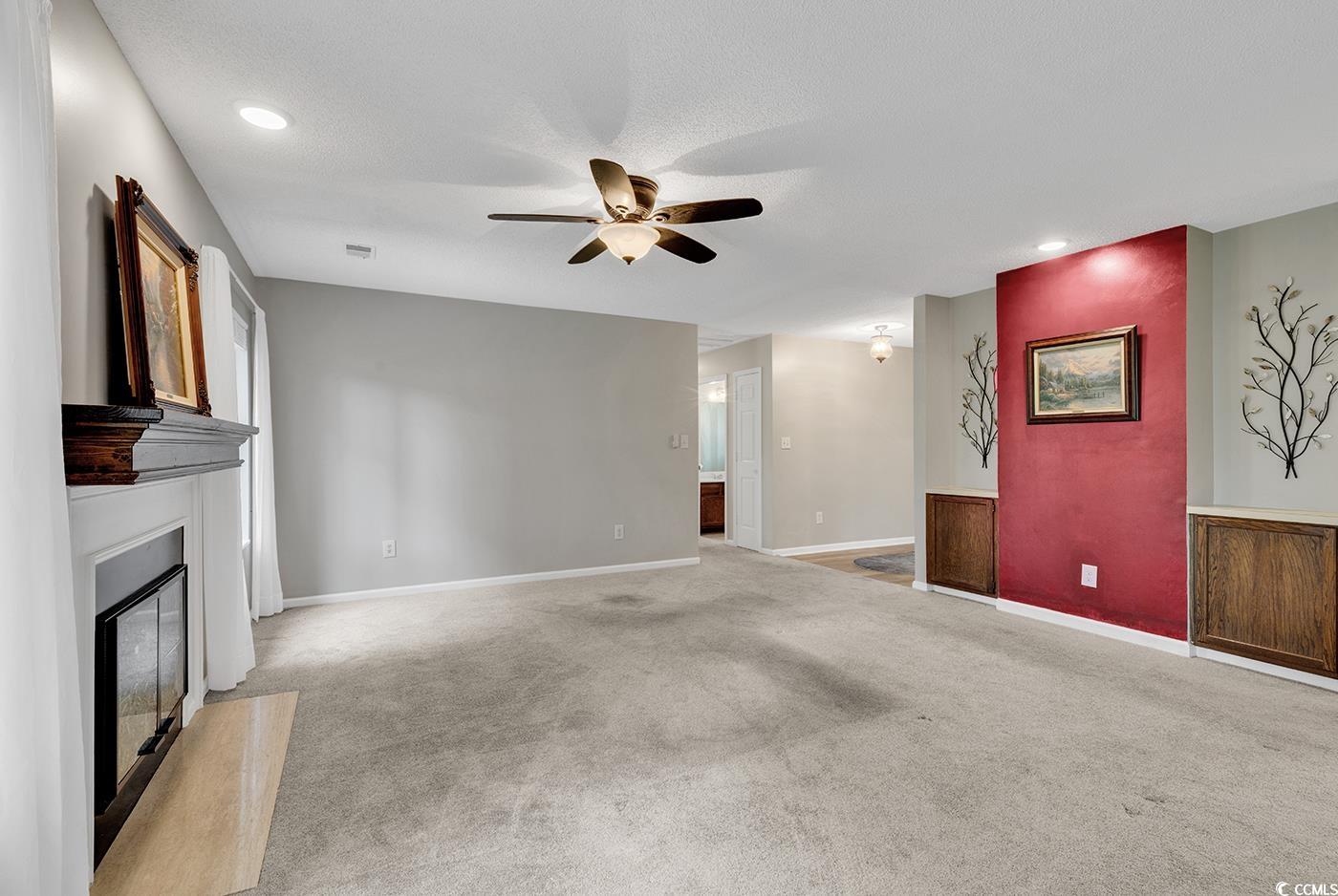 102 Berry Tree Lane Conway, SC 29526 - Photo 11 of 40 Unfurnished living room with light colored carpet,