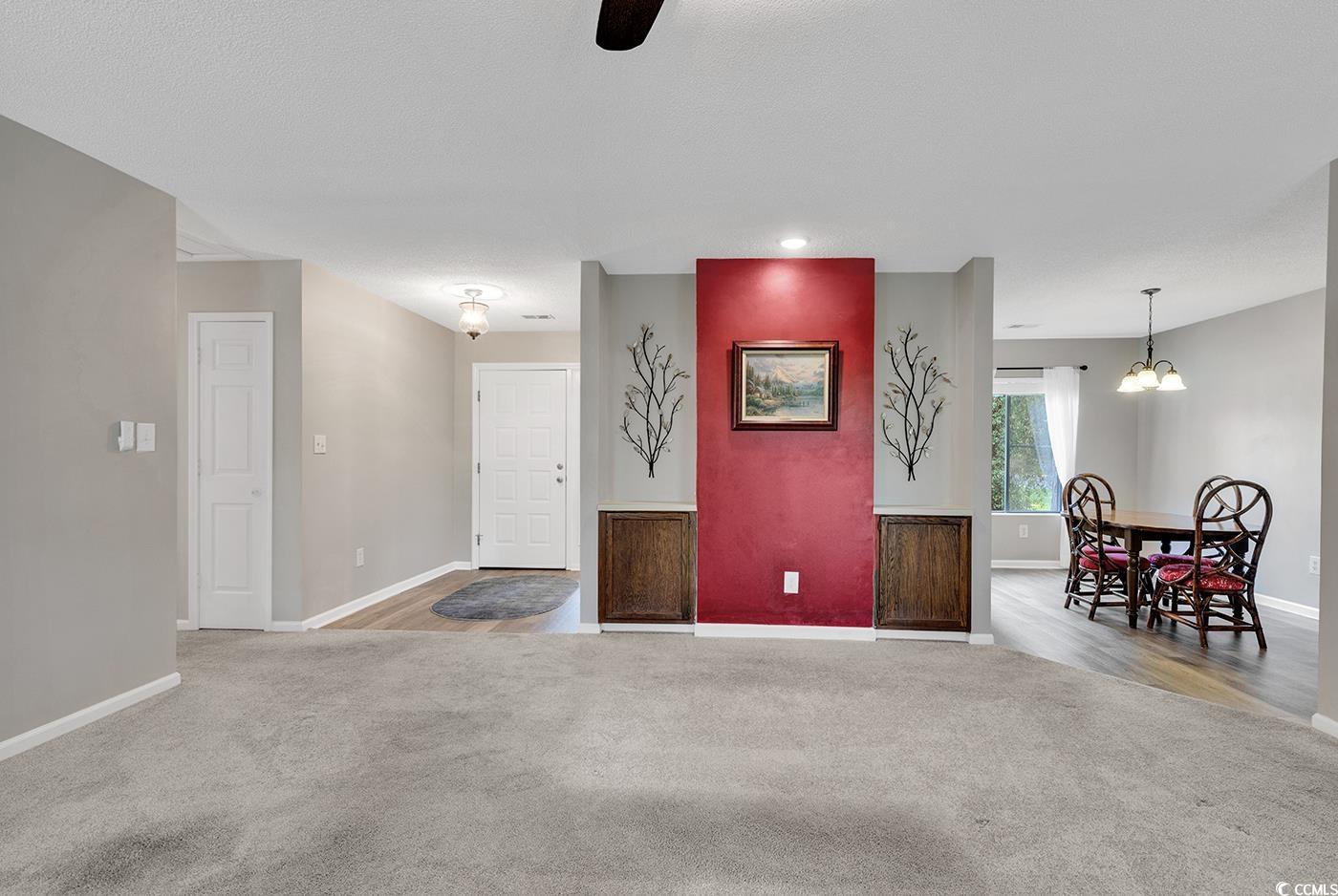 102 Berry Tree Lane Conway, SC 29526 - Photo 13 of 40 Empty room with carpet floors and a notable chande