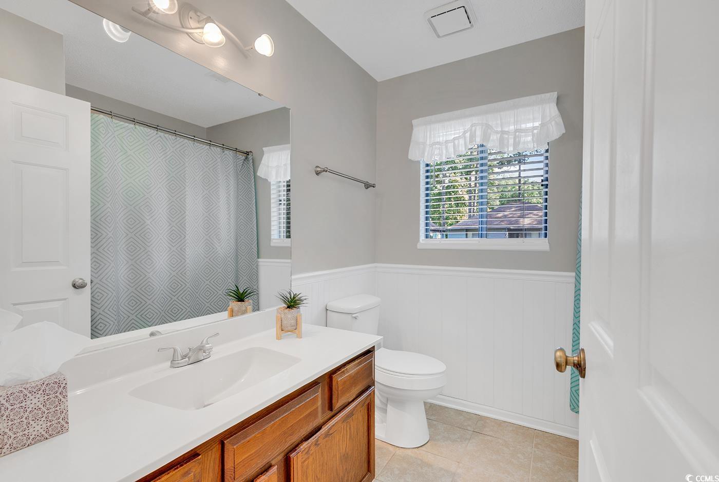 102 Berry Tree Lane Conway, SC 29526 - Photo 19 of 40 Bathroom with tile patterned floors, vanity, and t