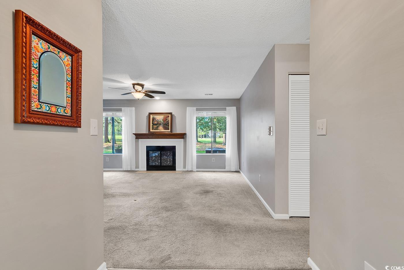 102 Berry Tree Lane Conway, SC 29526 - Photo 2 of 40 Unfurnished living room featuring plenty of natura