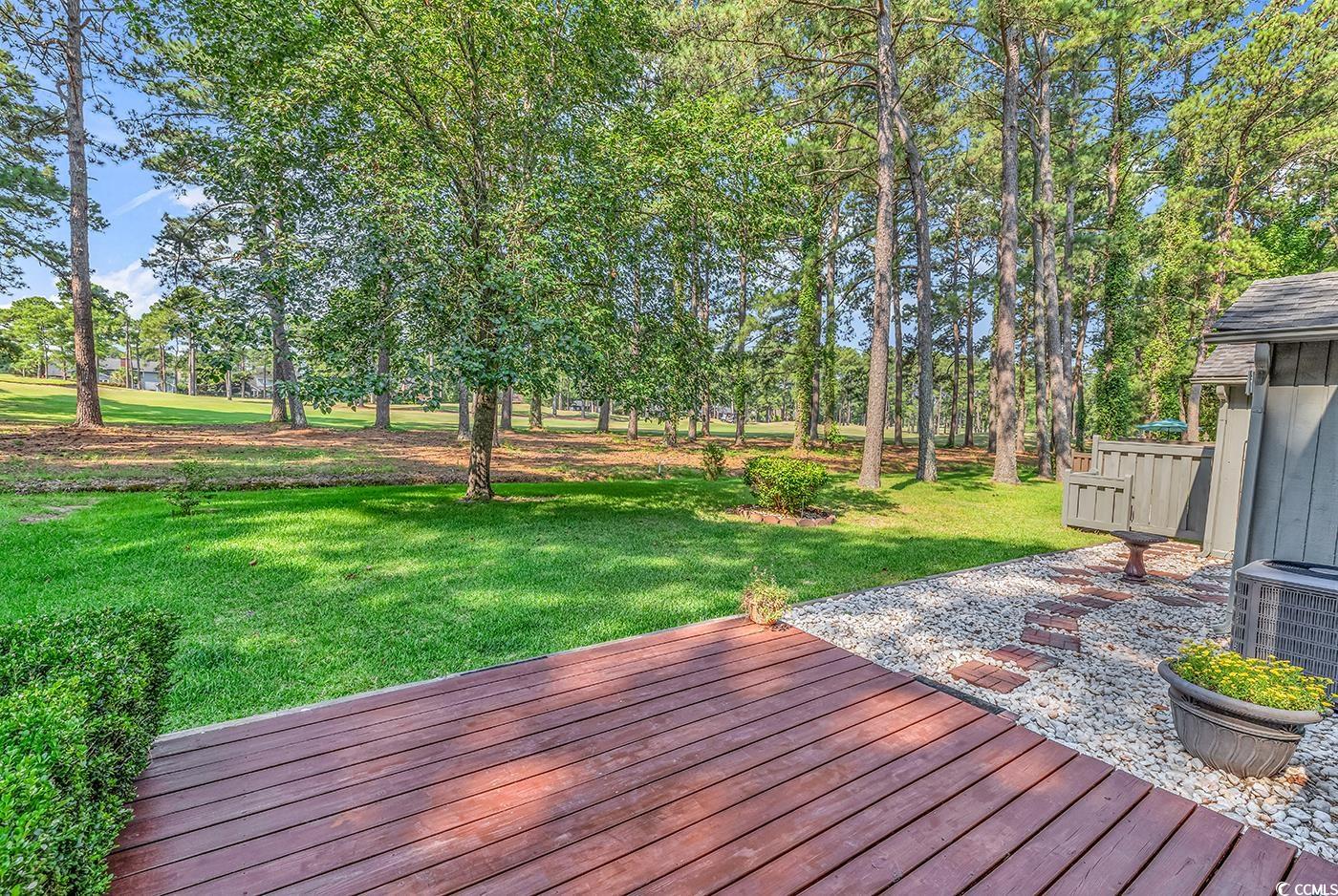 102 Berry Tree Lane Conway, SC 29526 - Photo 34 of 40 Deck featuring central AC and a lawn
