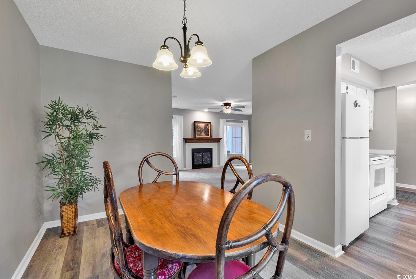 102 Berry Tree Lane Conway, SC 29526 - Photo 8 of 40 Dining space with hardwood / wood-style floors