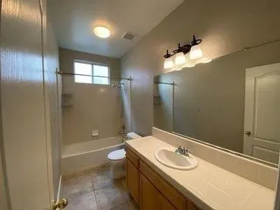 a bathroom with a sink and a tub