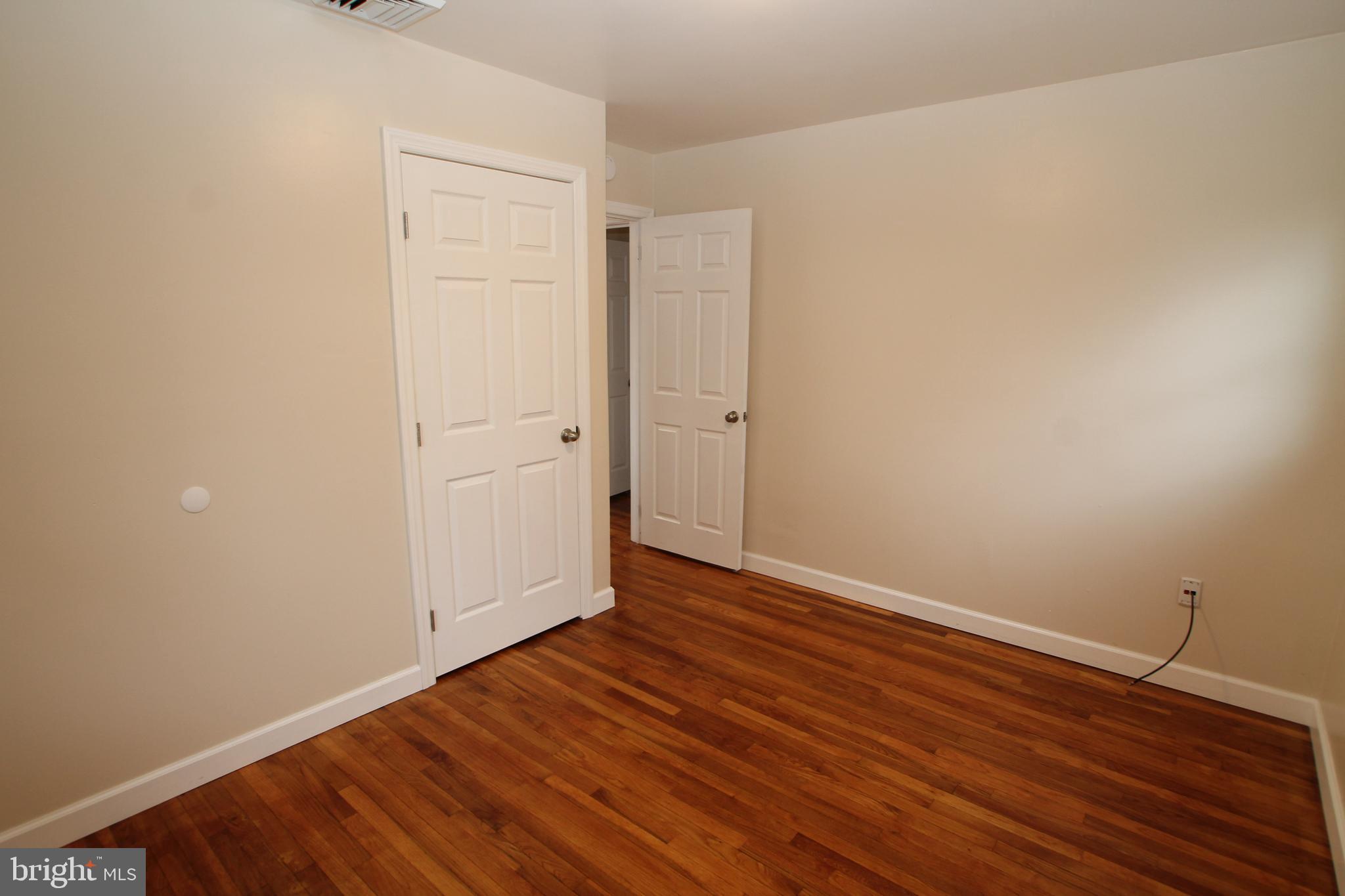 5871 Stump Road Pipersville, PA 18947 - Photo 21 of 33 a view of an empty room with wooden floor