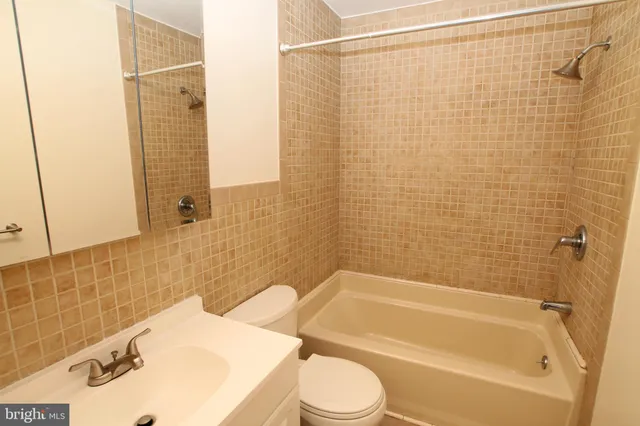 a bathroom with a sink and a bathtub