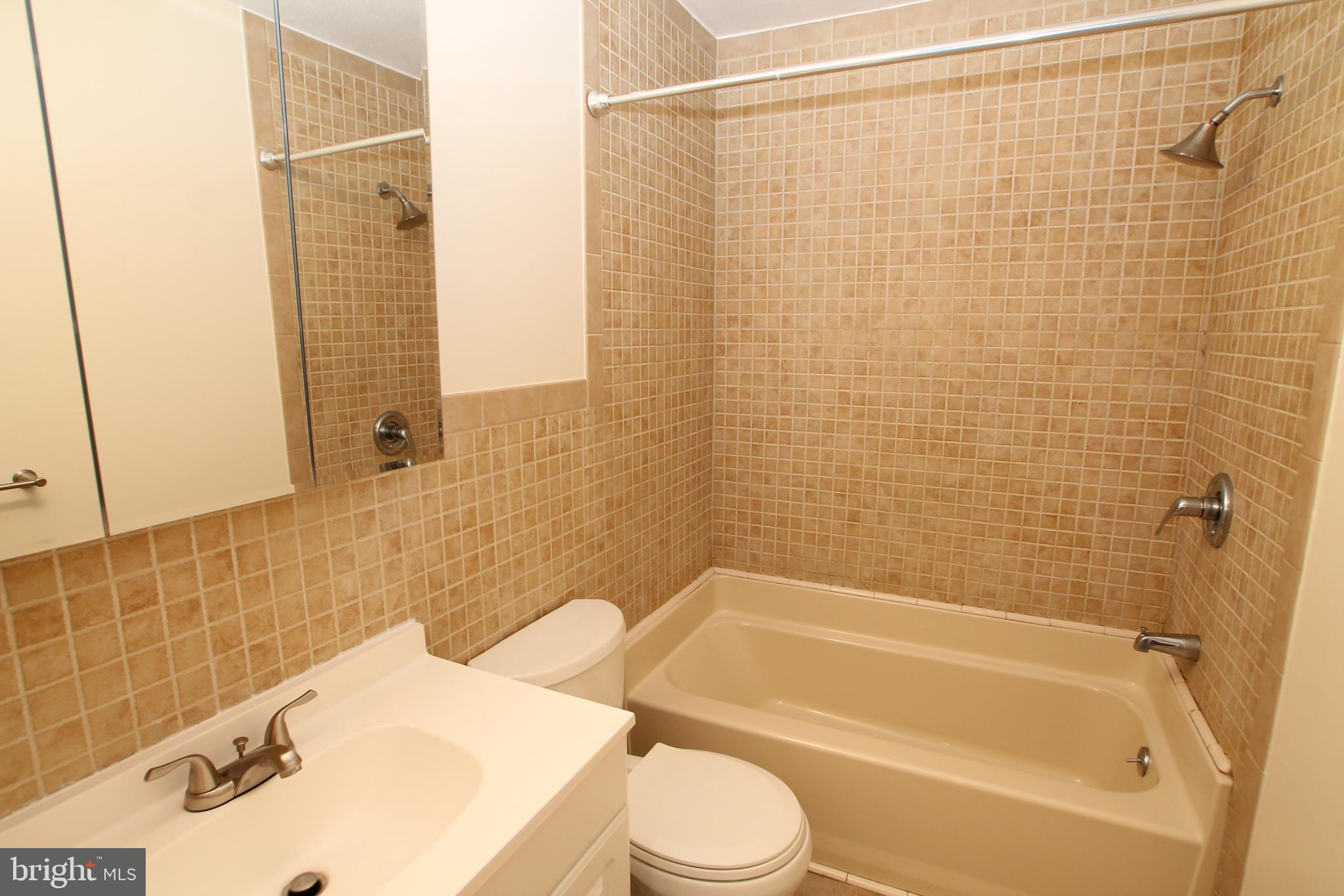 5871 Stump Road Pipersville, PA 18947 - Photo 25 of 33 a bathroom with a sink and a bathtub
