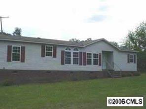 300 Madison Road China Grove, NC 28023 - Photo 1 of 1 a view of house with a yard