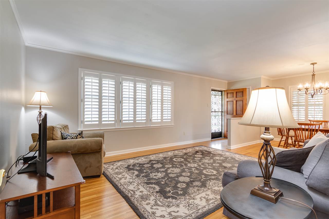 This view looks towards the front door.  Note the dining room on the right.