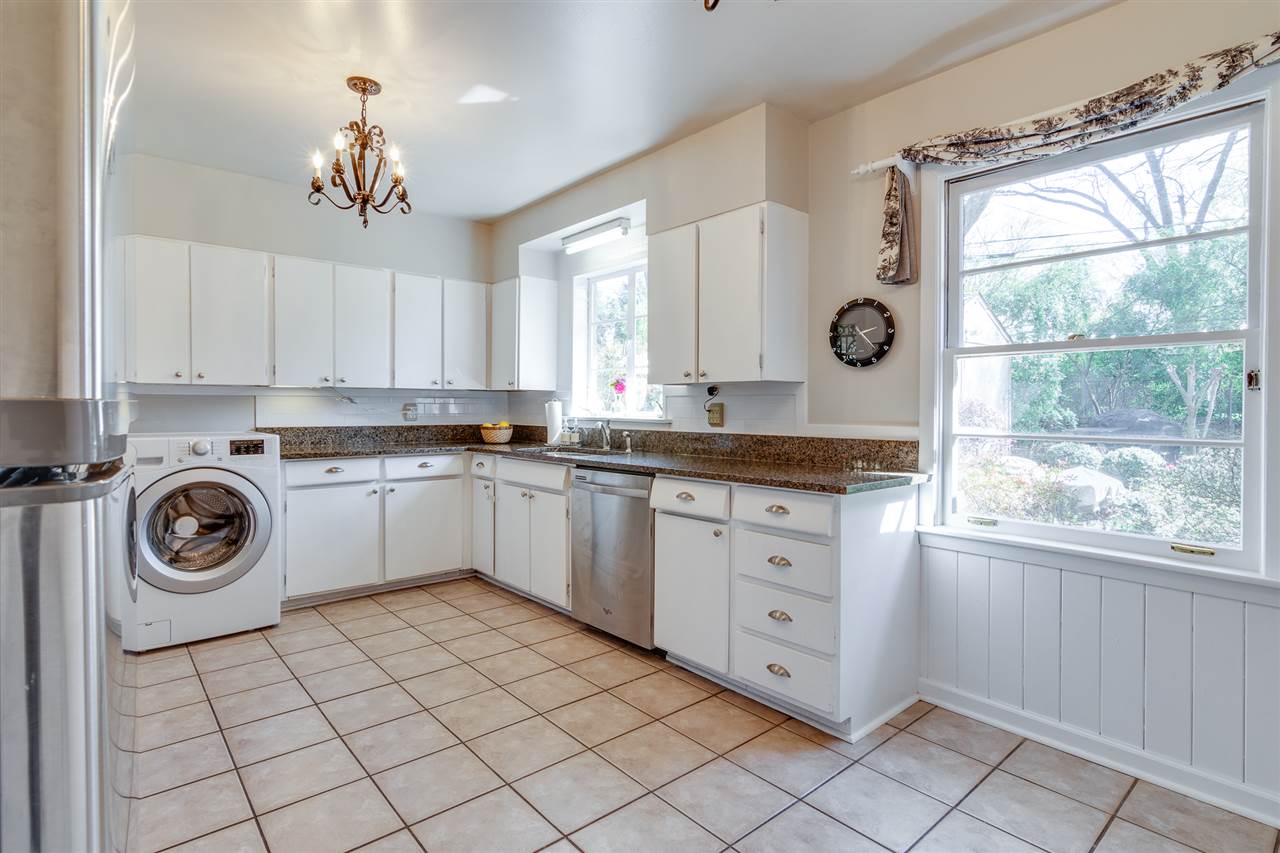 5125 Sequoia Road Memphis, TN 38117 - Photo 8 of 25 Updated Kitchen features a newer floor, granite tops, painted cabinets, newer hardware, newer backsplash as well as freshly painted walls.
