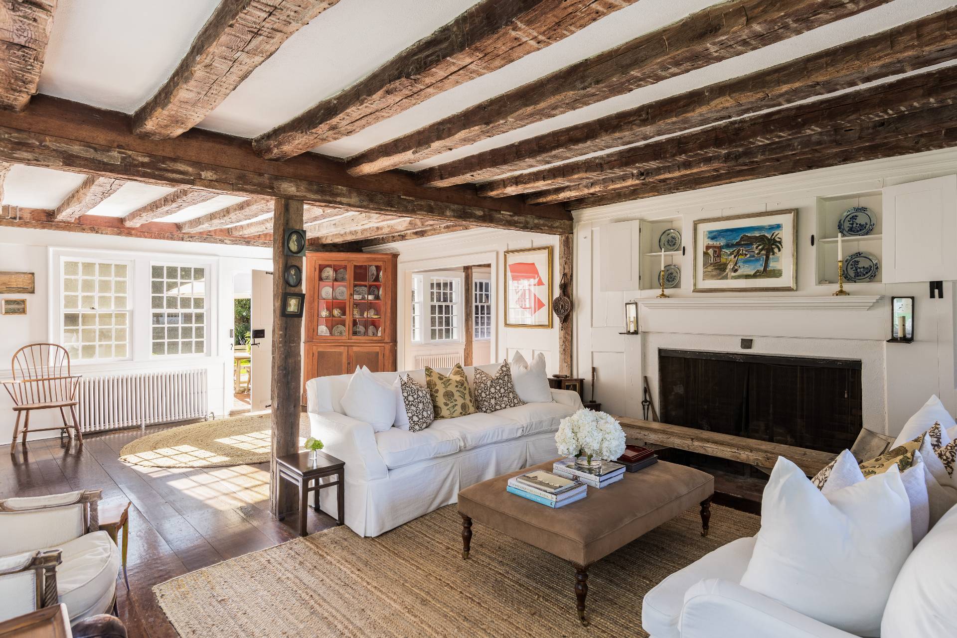117 Egypt Lane East Hampton, NY 11937 - Photo 14 of 36 a living room with furniture and a fireplace