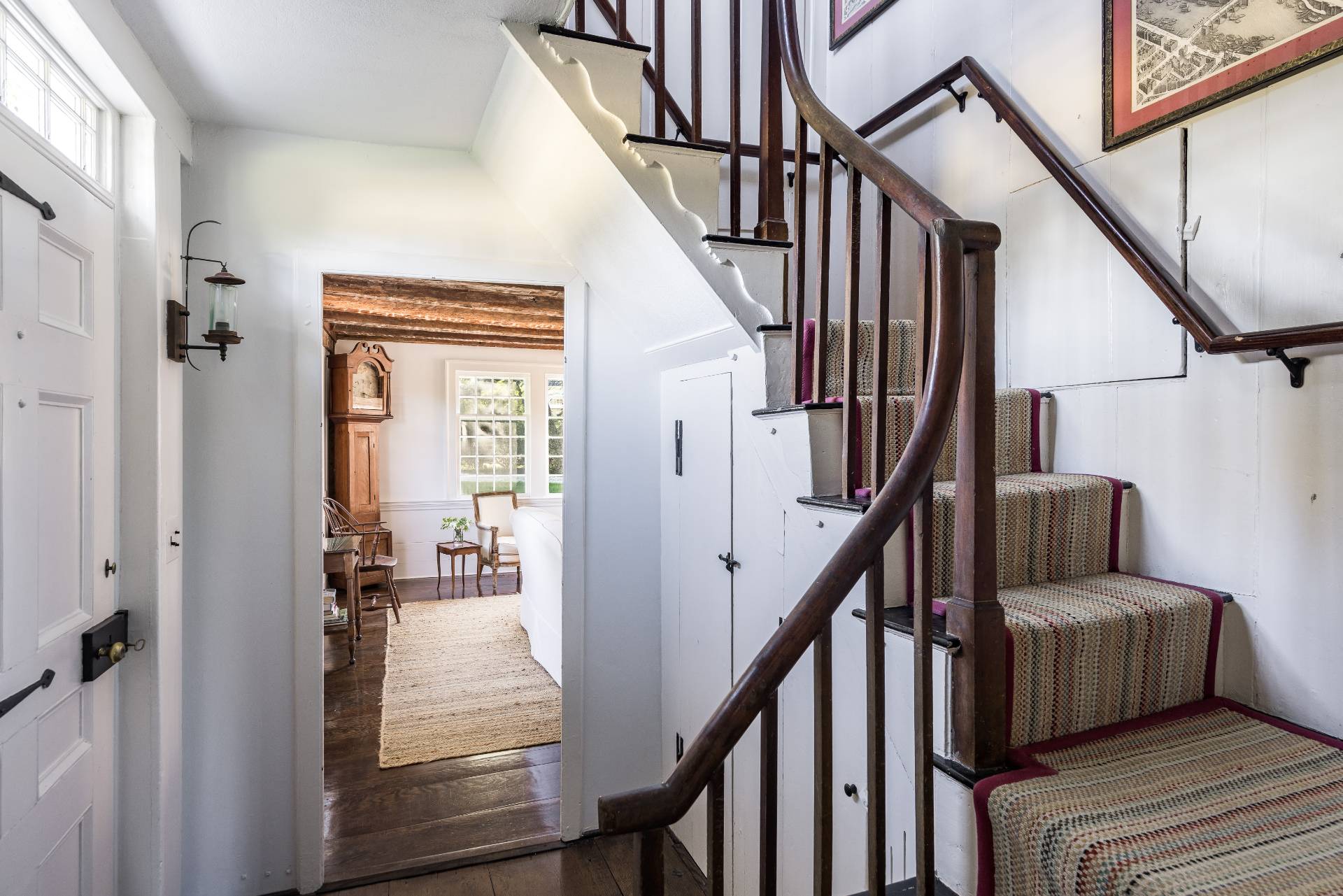 117 Egypt Lane East Hampton, NY 11937 - Photo 22 of 36 a view of entryway and hall with wooden floor