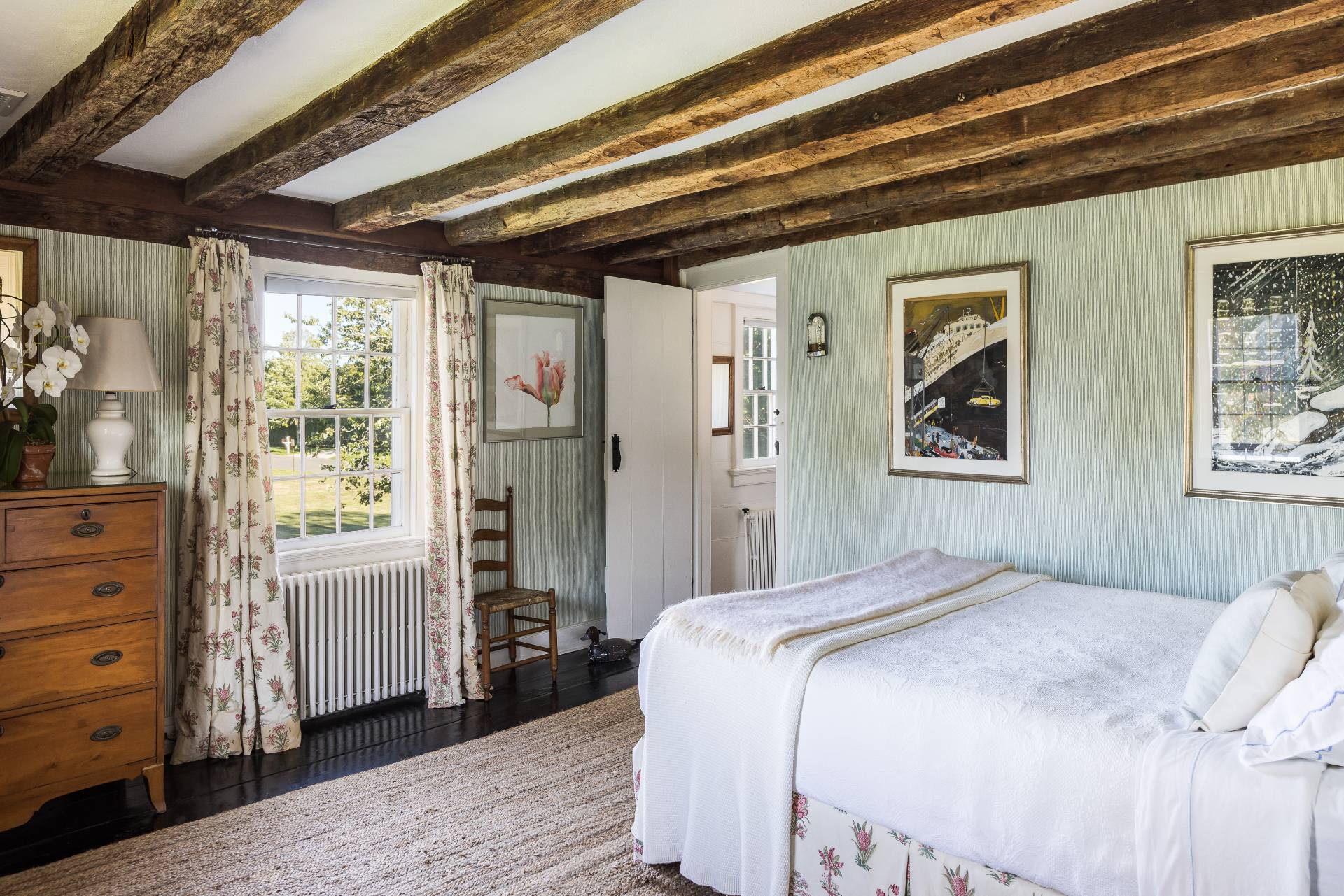 117 Egypt Lane East Hampton, NY 11937 - Photo 26 of 36 a bedroom with a large bed and a window