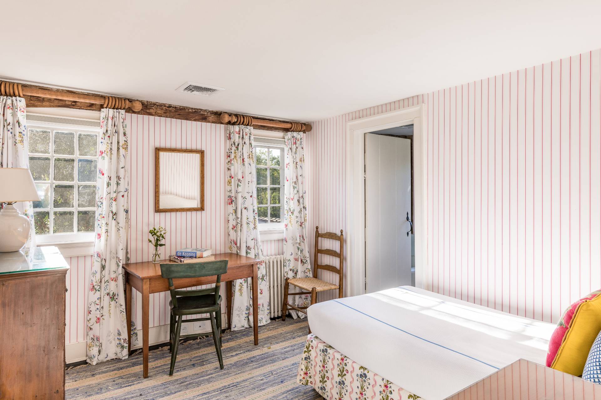 117 Egypt Lane East Hampton, NY 11937 - Photo 34 of 36 a bedroom with a bed and a window