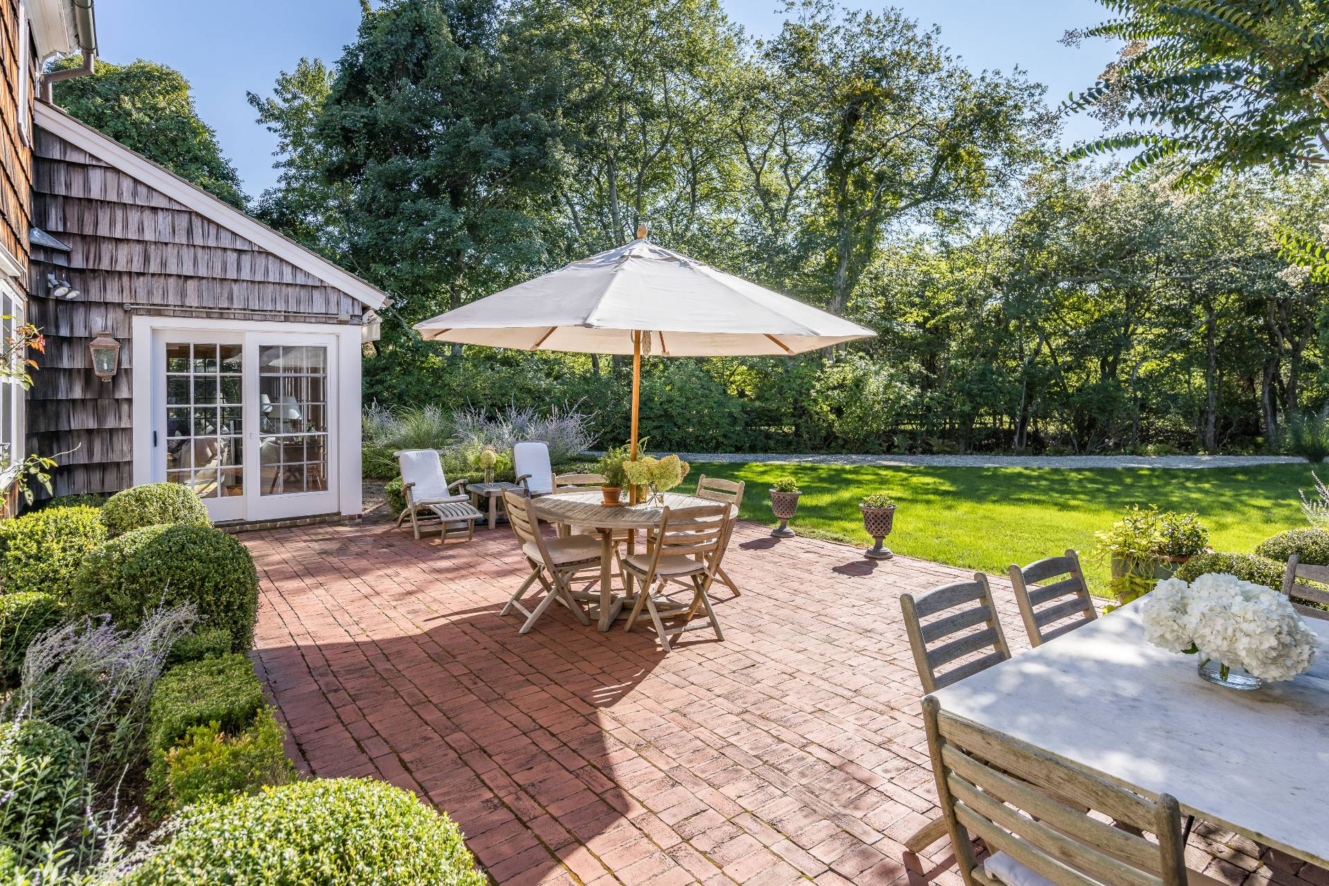 117 Egypt Lane East Hampton, NY 11937 - Photo 10 of 36 a view of a swimming pool with a patio