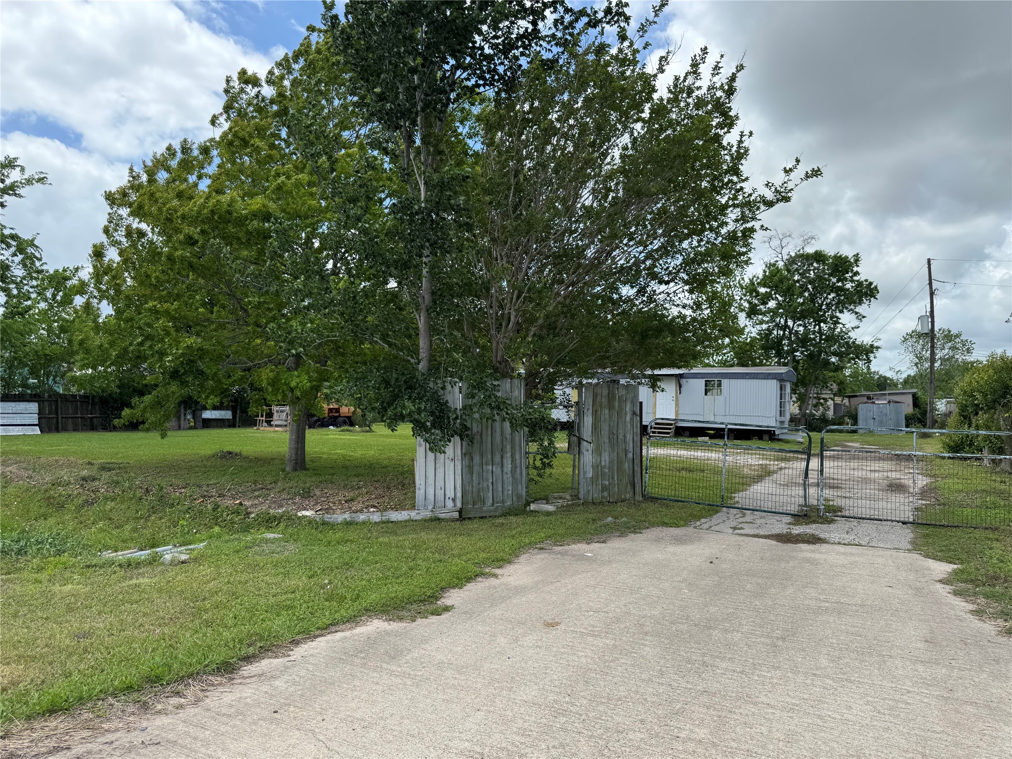 6226 County Road 48 Rosharon, TX 77583 - Photo 11 of 11 a view of a house with a yard and tree s