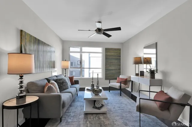 a living room with furniture and a window