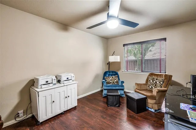 a view of a house with backyard and deck