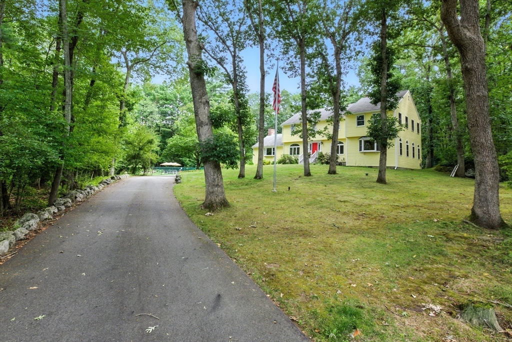 61 Pond Street Boxford, MA 01921 - Photo 1 of 38 a view of a park with trees