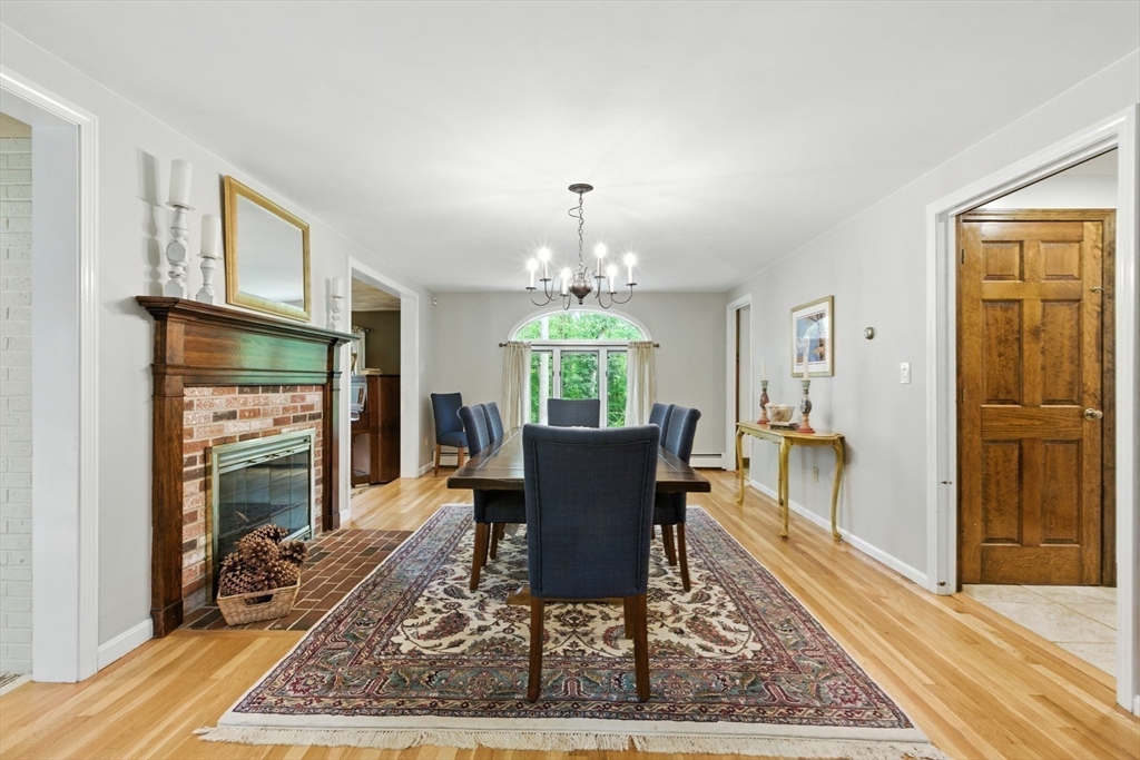 61 Pond Street Boxford, MA 01921 - Photo 18 of 38 a view of a livingroom with furniture window and wooden floor