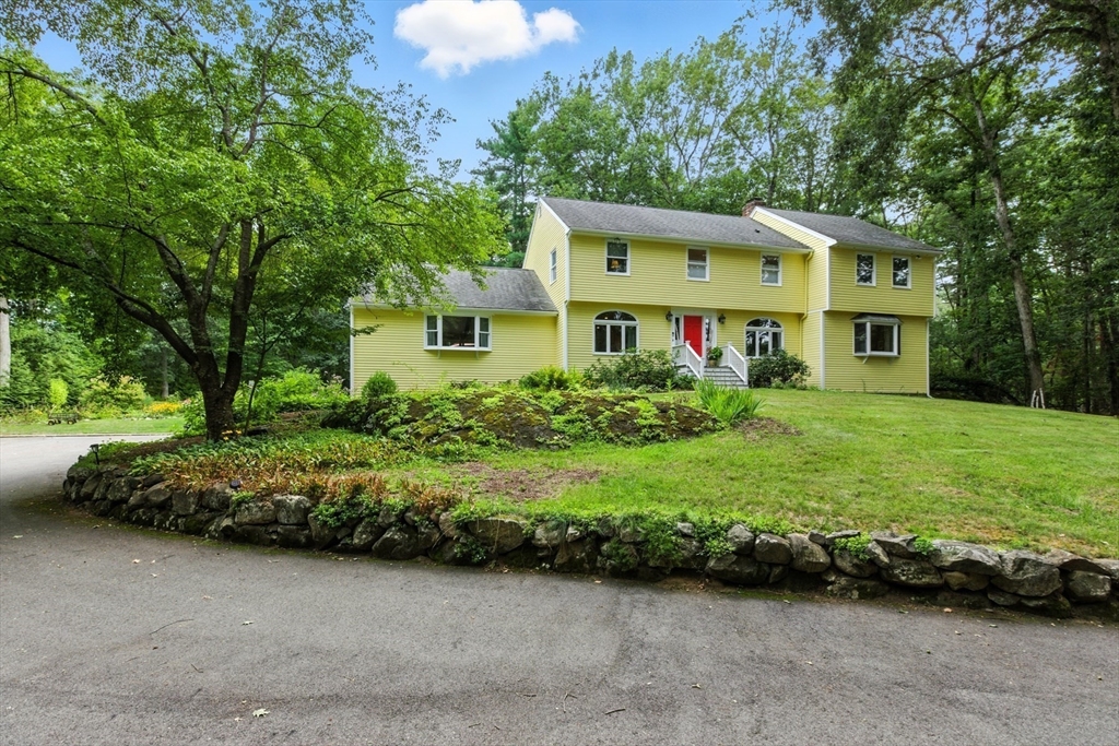 61 Pond Street Boxford, MA 01921 - Photo 2 of 38 a view of front of house with a yard