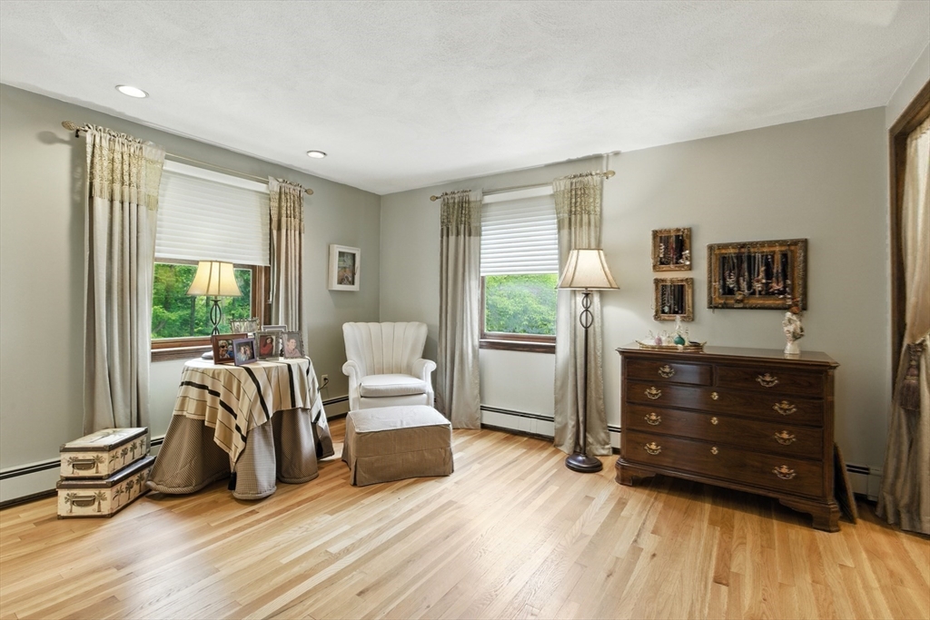 61 Pond Street Boxford, MA 01921 - Photo 27 of 38 a living room with furniture and a wooden floor