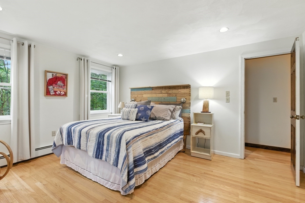 61 Pond Street Boxford, MA 01921 - Photo 30 of 38 a bed room with a bed and a window