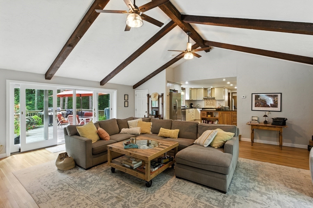 61 Pond Street Boxford, MA 01921 - Photo 10 of 38 a living room with furniture and a large window