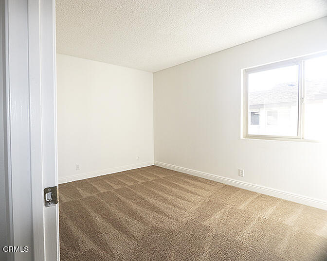 3224 Sunset Lane Oxnard, CA 93035 - Photo 15 of 20 an empty room with a window