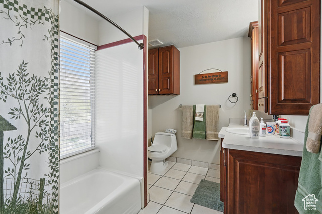 2490 South State Street Springville, UT 84663 - Photo 28 of 38 Bathroom featuring curtained shower, a bathtub, toilet, vanity, and tile patterned flooring