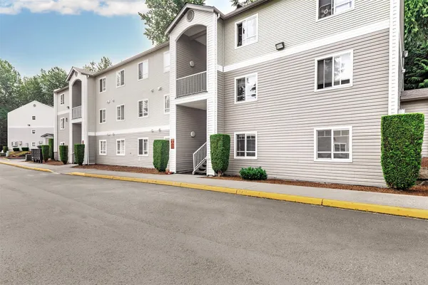 a view of a house with a street