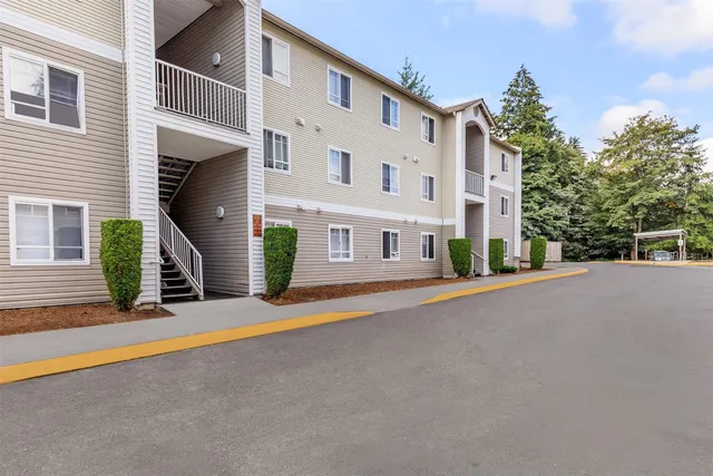 a view of a building with a street