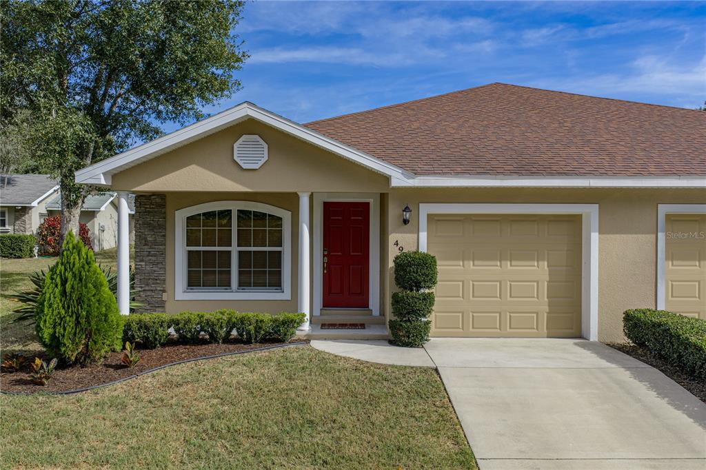4924 South Dossey Road Lakeland, FL 33811 - Photo 2 of 41 front view of a house with a yard