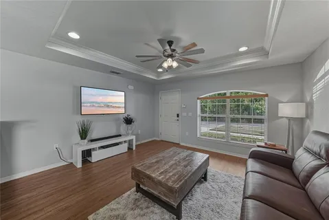 a living room with furniture and a window