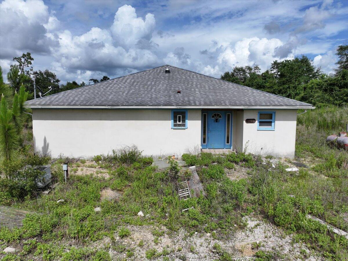 5704 Arnold Road Panama City, FL 32404 - Photo 15 of 25 a backyard of a house with lots of green space