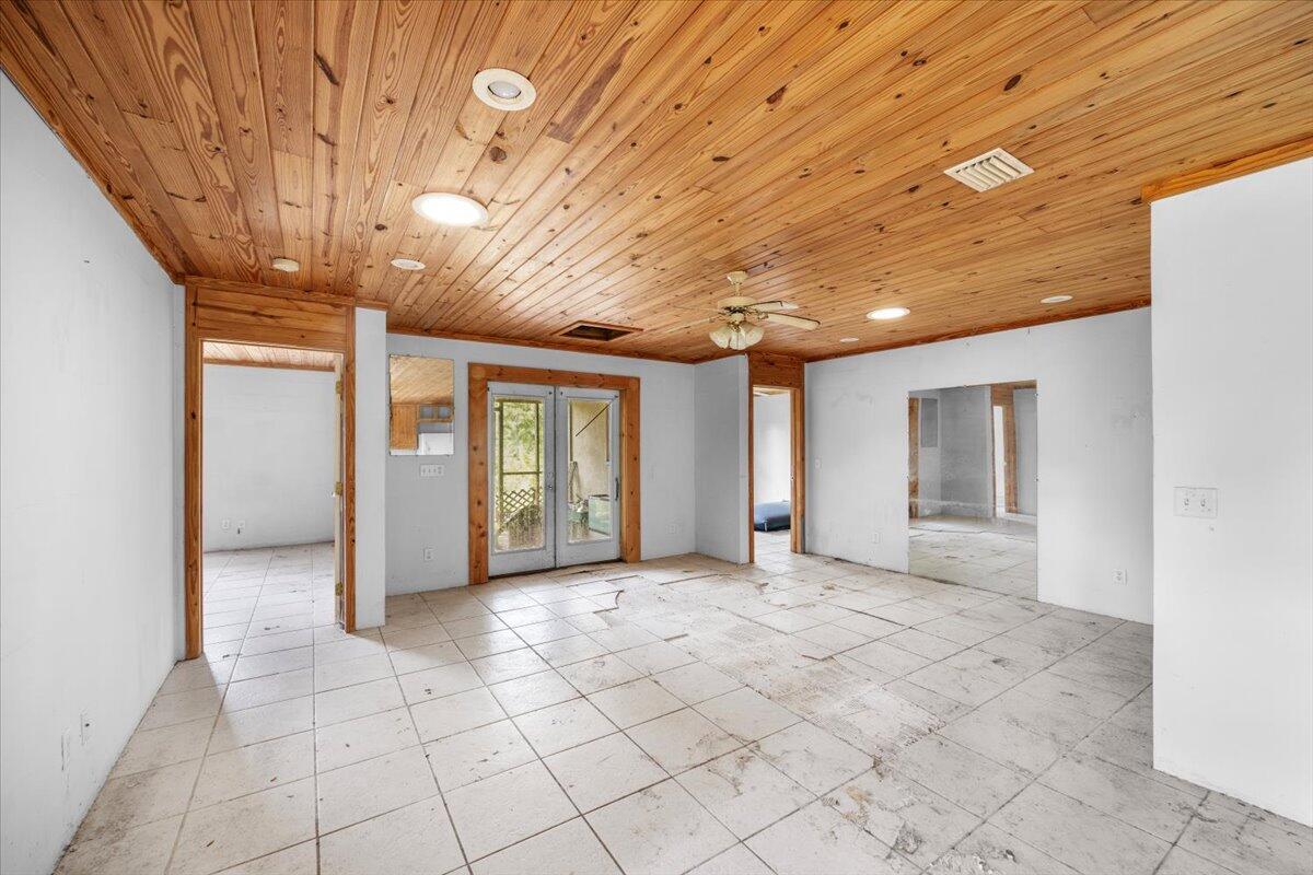 5704 Arnold Road Panama City, FL 32404 - Photo 18 of 25 a view of empty room with wooden floor