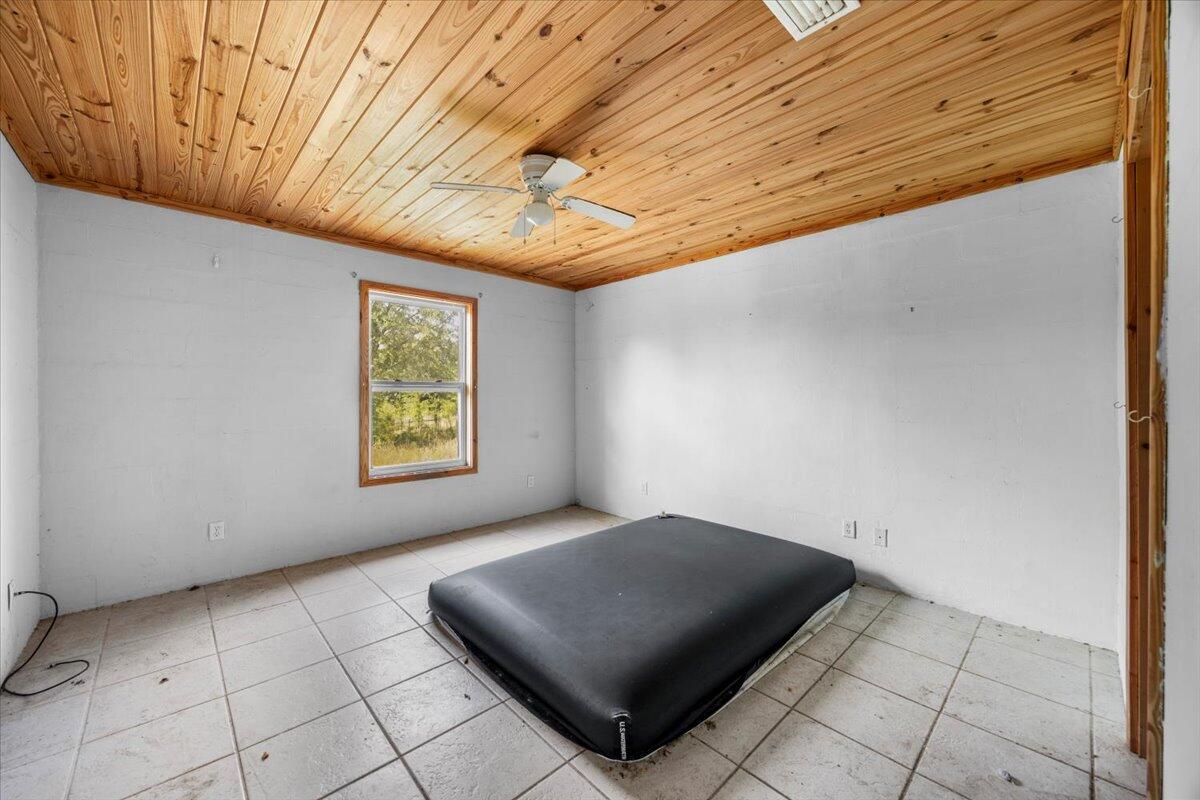 5704 Arnold Road Panama City, FL 32404 - Photo 21 of 25 a view of an empty room and window