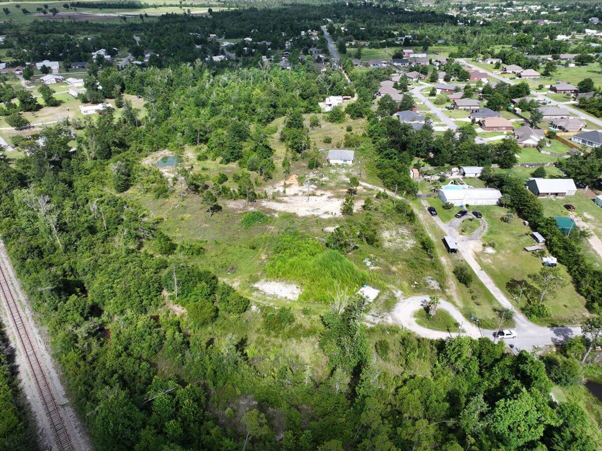 5704 Arnold Road Panama City, FL 32404 - Photo 7 of 25 a view of a lush green field