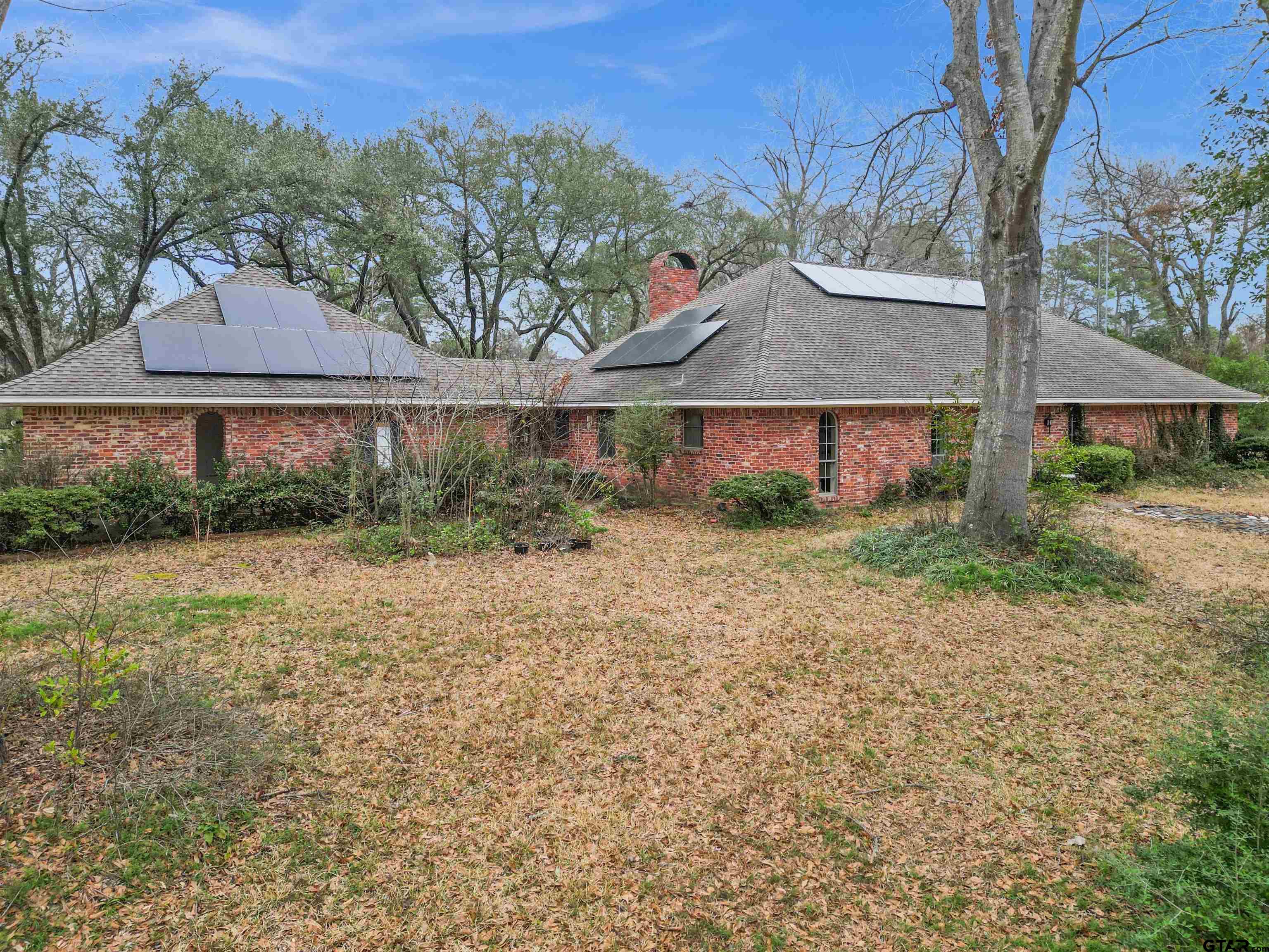 1004 Jeff Davis Drive Tyler, TX 75703 - Photo 3 of 12 a view of a backyard